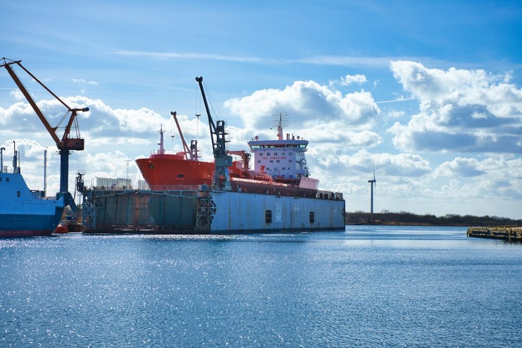 Oil tanker docked in a port, supported by a project logistics company in Malaysia.